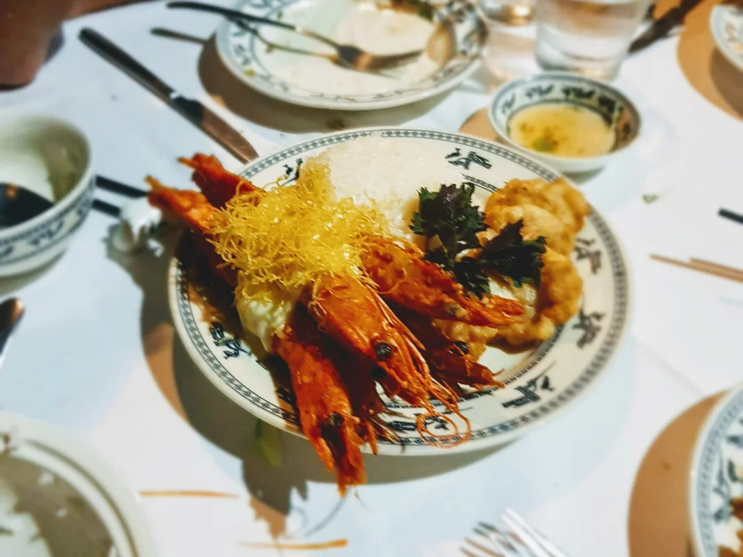 A meal on Dragon Legend, Indochina Junk - Bai Tu Long Bay Luxury Cruise - World Travel Ambitions