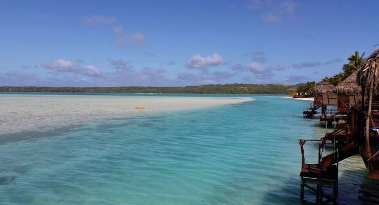 Overwater bungalows at Aitutaki Lagoon Resort and Spa