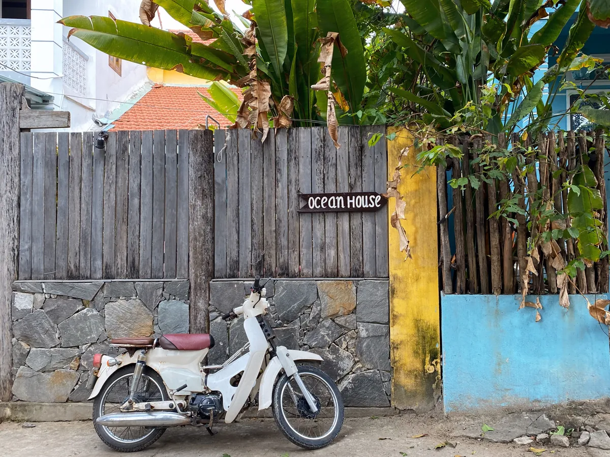 Charming alleyways near An Bang Beach in Hoi An, Vietnam showing local architecture and tropical vegetation