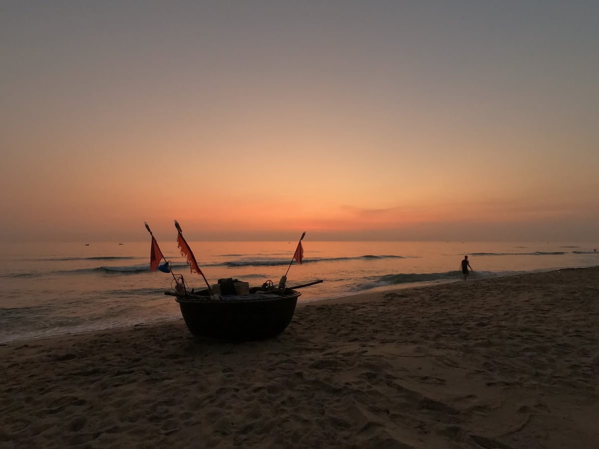 Beachfront family villa in An Bang Beach Vietnam with ocean view and outdoor dining area