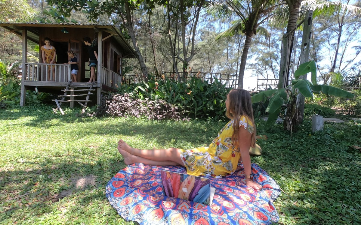 Family-friendly accommodation options in An Bang Beach, Vietnam showing tropical bungalows and beachfront villas perfect for long-term stays