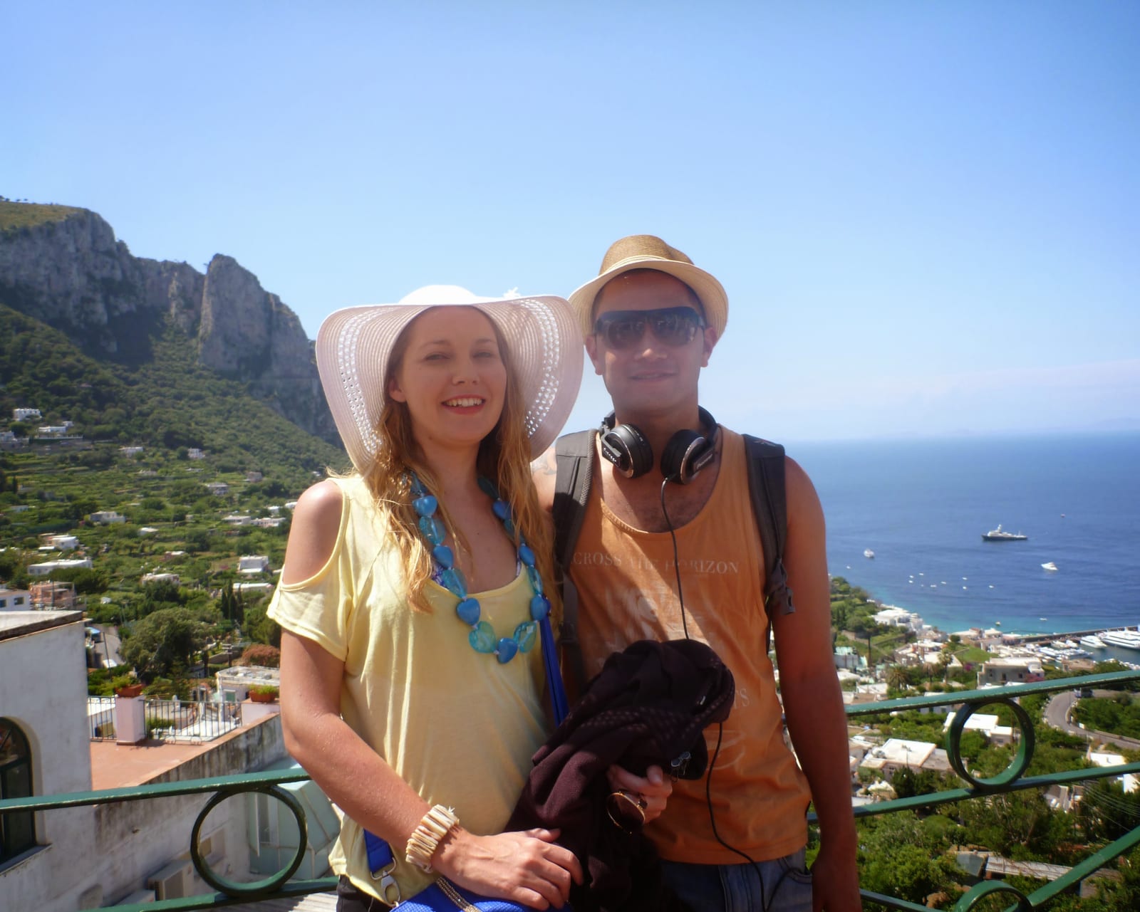 Melissa and Rimaha above the hillside and harbour on Capri, Italy