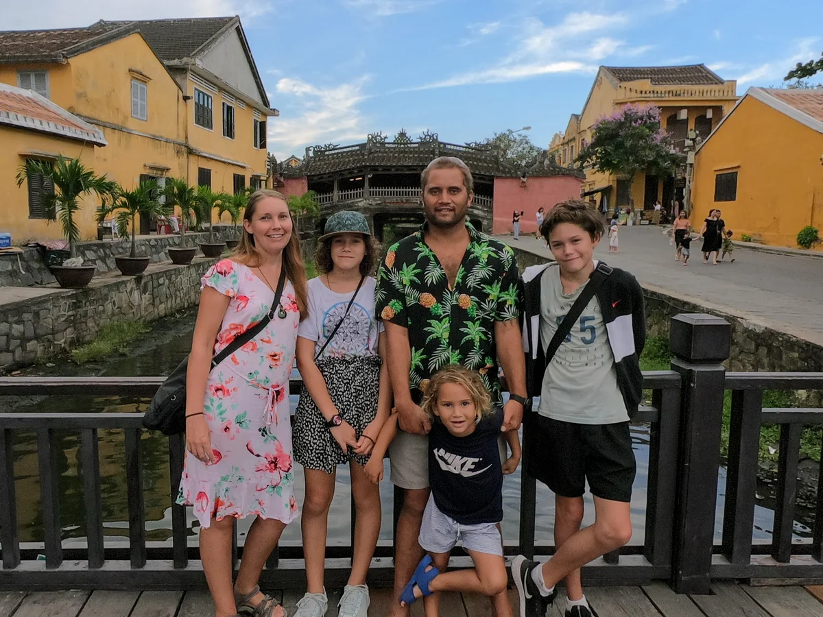World Travel Ambitions family at the Japanese Bridge in Hoi An, Vietnam