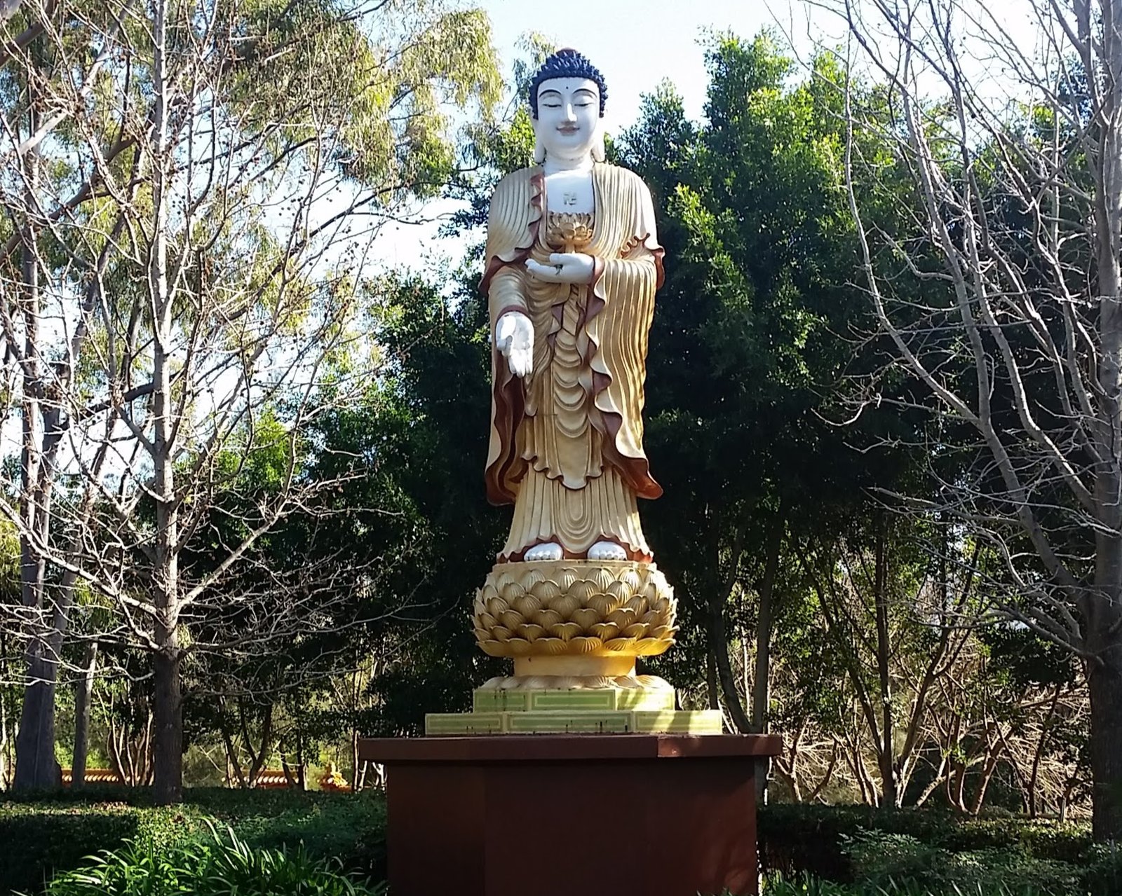 Standing Buddha statue at Nan Tien Temple entrance, Sydney NSW