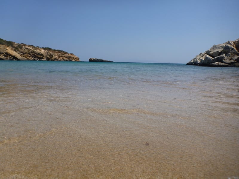 Clear shallow water at a quiet beach on Paros, Greece