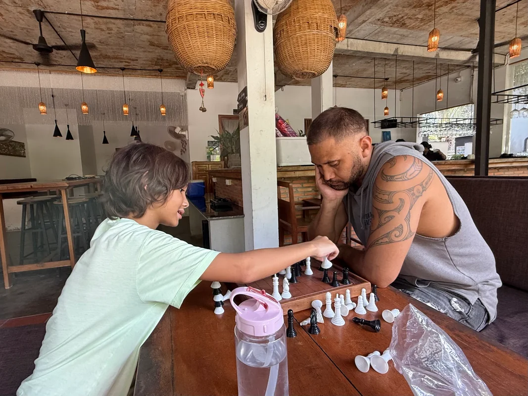 Chess game at Le Forest Resort Phu Quoc - Worldschooling families enjoying indoor activities