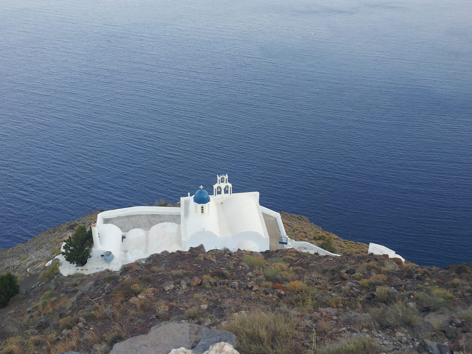 White church near Skaros Rock, Santorini, Greece